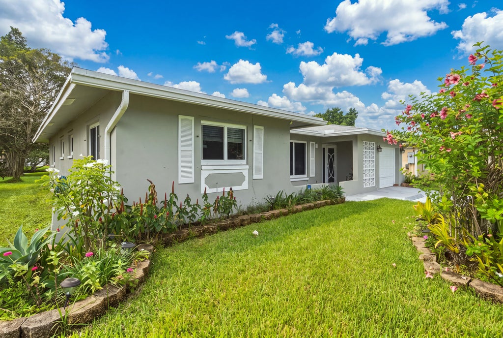 Photo of 4404 NW 45TH Court, Tamarac, FL 33319 (MLS # B26091061)