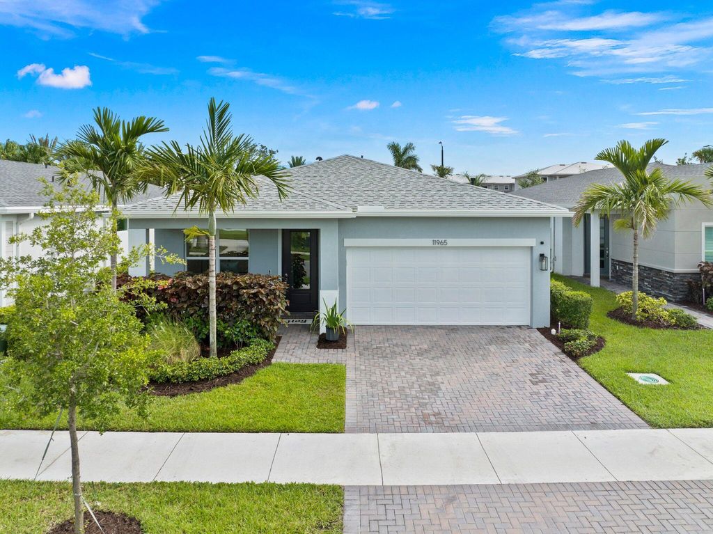 Photo of 11965 SW Lyra Drive, Port St Lucie, FL 34987 (MLS # R10906645)