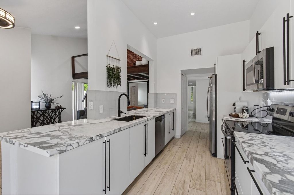 Photo of 1089 NW 13th Street #1, Boca Raton, FL 33486 (MLS # F10510974)