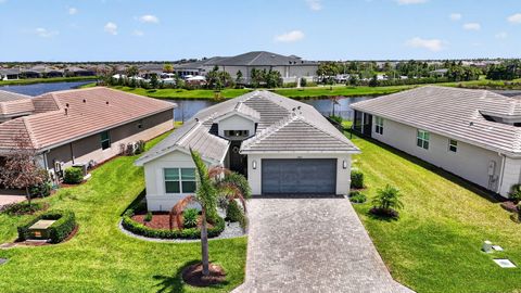 Photo of 11869 SW Poseidon Way, Port Saint Lucie, FL 34987 (MLS # B26018128)