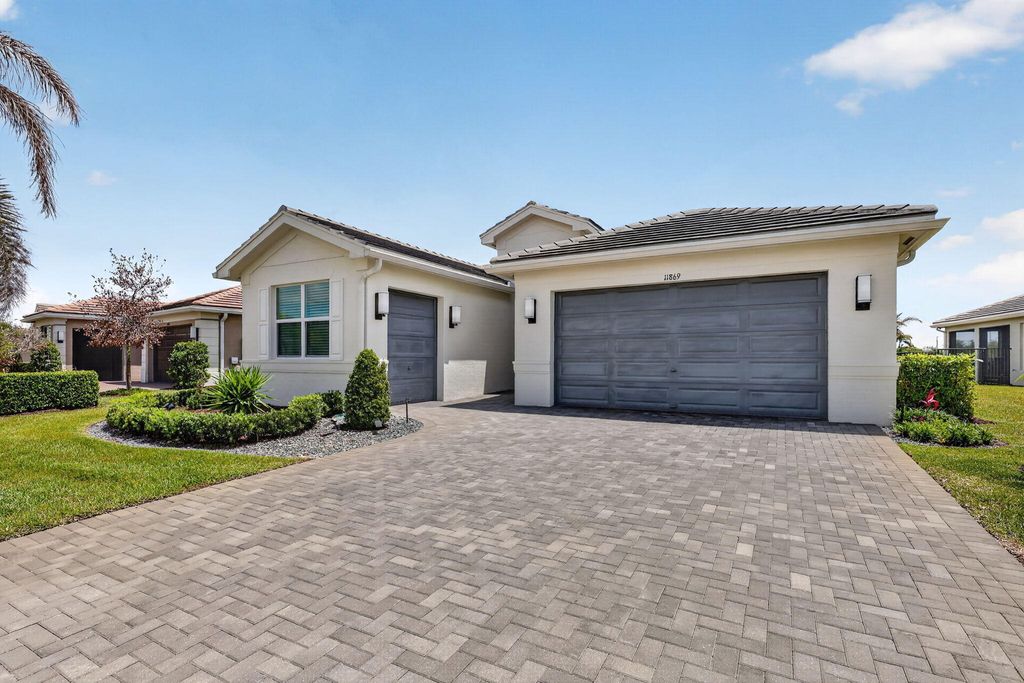 Photo of 11869 SW Poseidon Way, Port Saint Lucie, FL 34987 (MLS # B26018128)