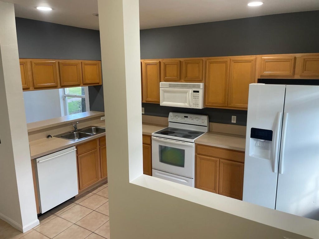 Photo of 4968 Palmbrooke Circle, West Palm Beach, FL 33417 (MLS # B26041068)