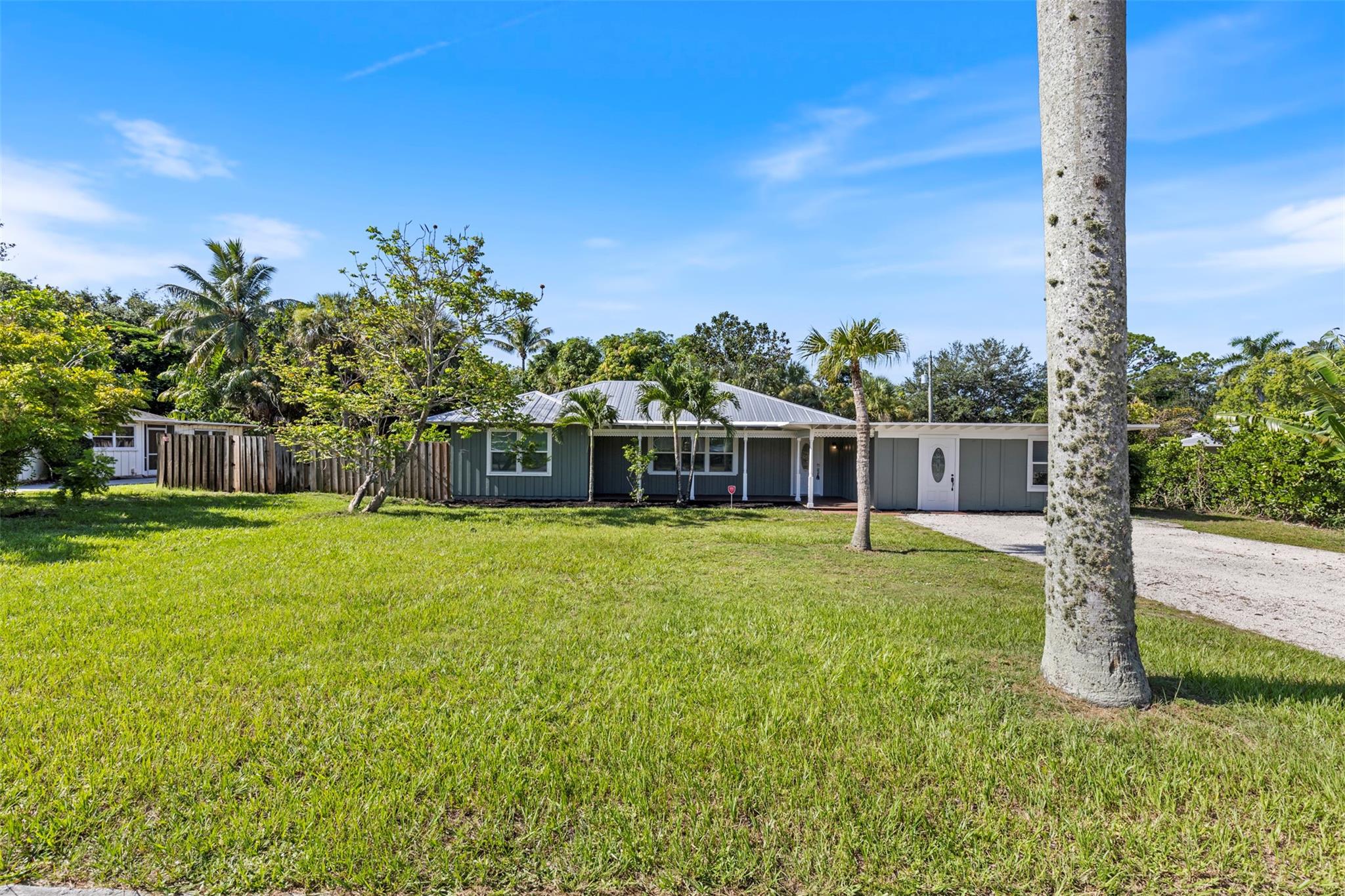 FREE Credit Toward Brand-New Impact Windows with Full-Price Offer!
Discover this beautifully renovated, centrally located Stuart gem with NO HOA! Just minutes from vibrant downtown Stuart, this spacious 3-bedroom home features an open-concept layout, vaulted ceilings, and a HUGE fully fenced yard on an oversized lot—perfect for entertaining, kids, or pets.
The luxurious master bathroom is a true retreat, boasting a standalone soaking tub, his-and-hers shower heads, and a dual vanity with two sinks—a spa-like experience right at home.
Need extra space? A bonus flex room with a private entrance offers endless possibilities: home office, guest suite, in-law suite, or a 4th bedroom.
Schedule your showing today—opportunities like this don’t last!