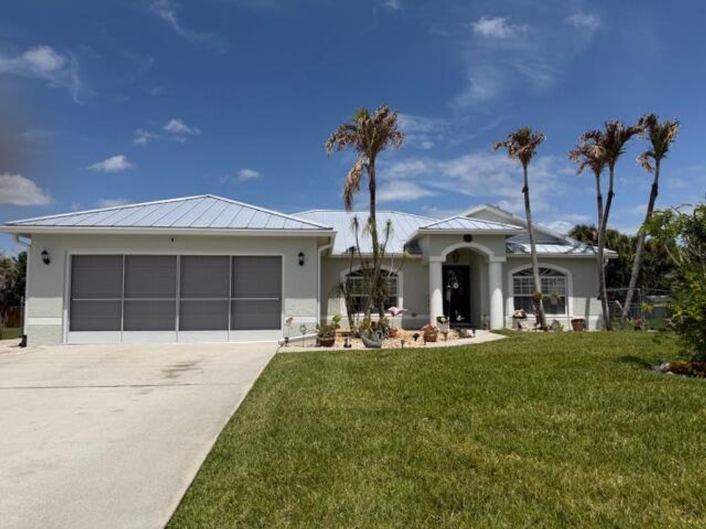 Photo of 925 SW Worcester Lane SW, Port Saint Lucie, FL 34953 (MLS # B26016090)