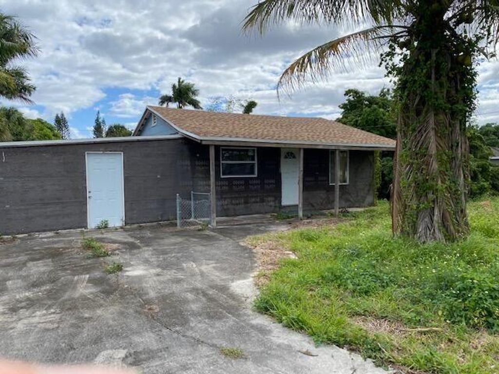 Photo of 3696 Coconut Road, Palm Springs, FL 33461 (MLS # R10869952)