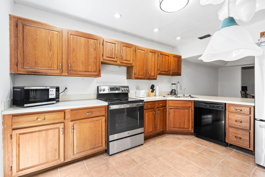 Photo of 704 Maplewood Drive, Greenacres, FL 33415 (MLS # R11135937)