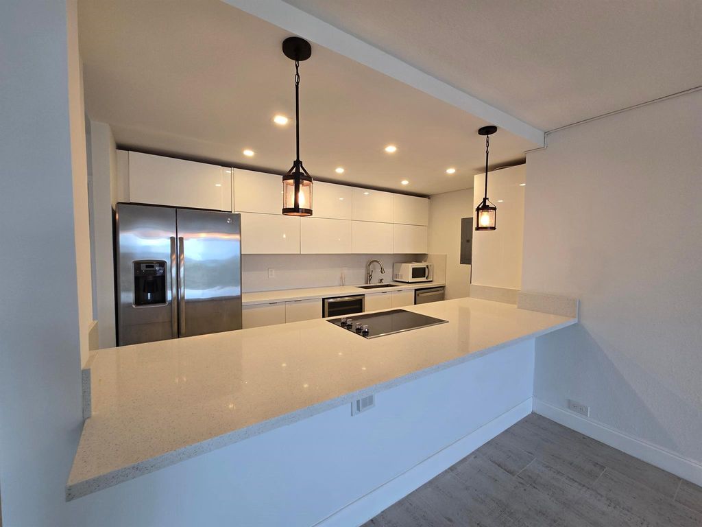 Photo of 1208 Marine Way #306, North Palm Beach, FL 33408 (MLS # R11029102)