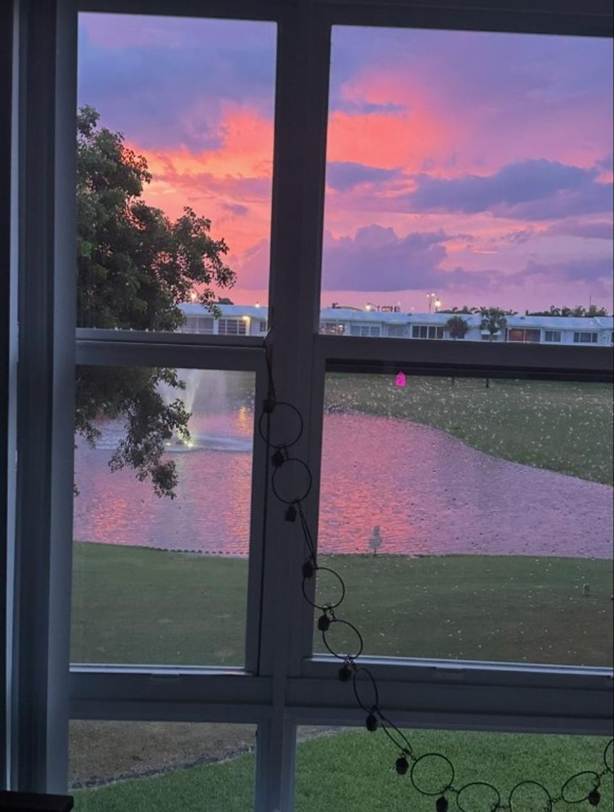 Beautifully Upgraded 2nd floor 2bedroom 2 Bath condo. Corner unit with a spectacular SW view of the golf course and small lake with fountain from Lanai. Come play a round of Golf in this 55+ community 2 Community Pools ,Bocce Ball, Shuffle Board, Billiard, foosball and Darts all included for residents to enjoy! Premium Tile throughout, Premium Kitchen Cabinets, New SS Appliances, Impact windows in 2025, Accordion Shutters on all windows. Common Laundry room is on the 1st floor. 1 parking space included, Guest parking spots are for temporary use. Low $463 total monthly Maintenance fee for both Main association and Building - Min credit score of 700 for each resident , Association Application fee $350 per person or per Married Couple. No rentals allowed