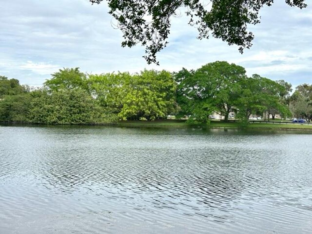 Photo of 9450 Poinciana Place #301, Davie, FL 33324 (MLS # B26001638)