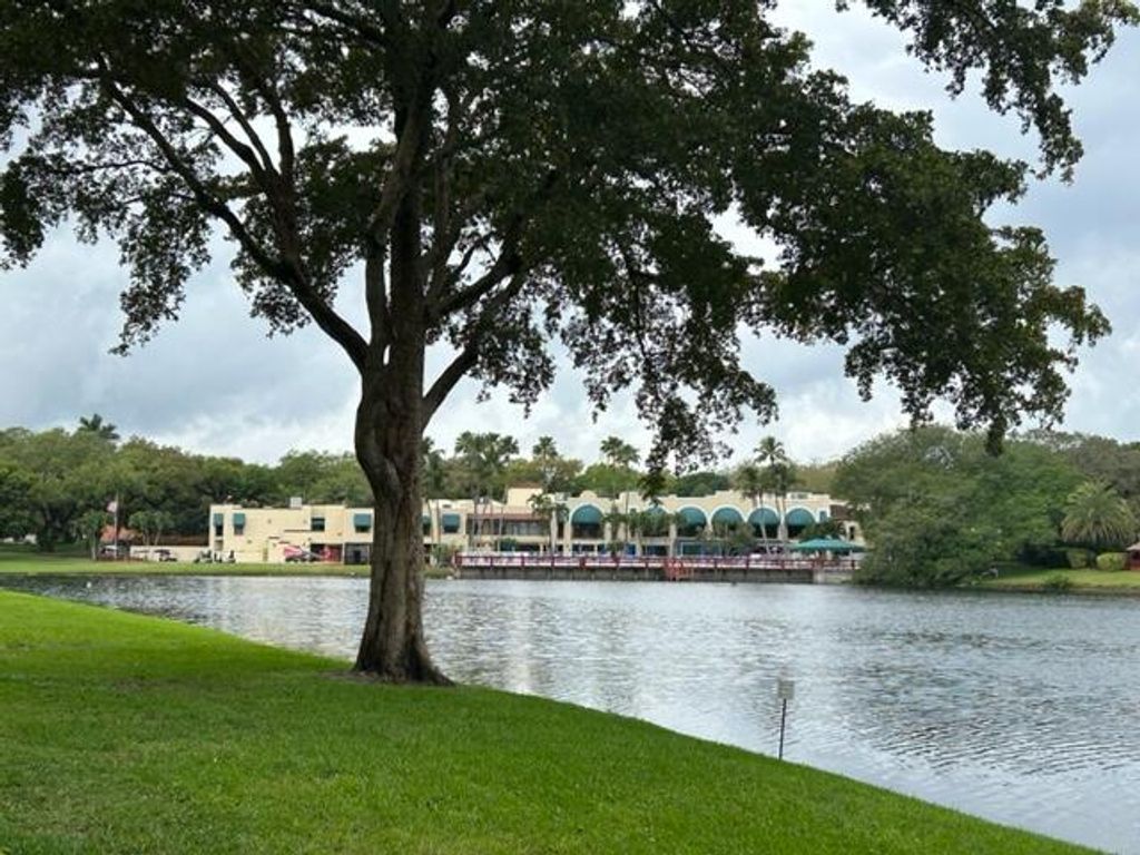 Photo of 9450 Poinciana Place #301, Davie, FL 33324 (MLS # B26001638)