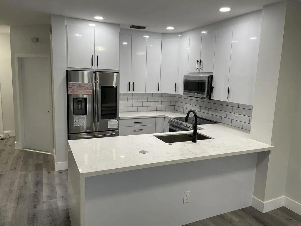 Photo of 12171 SW 4th Street, Pembroke Pines, FL 33025 (MLS # R11094609)