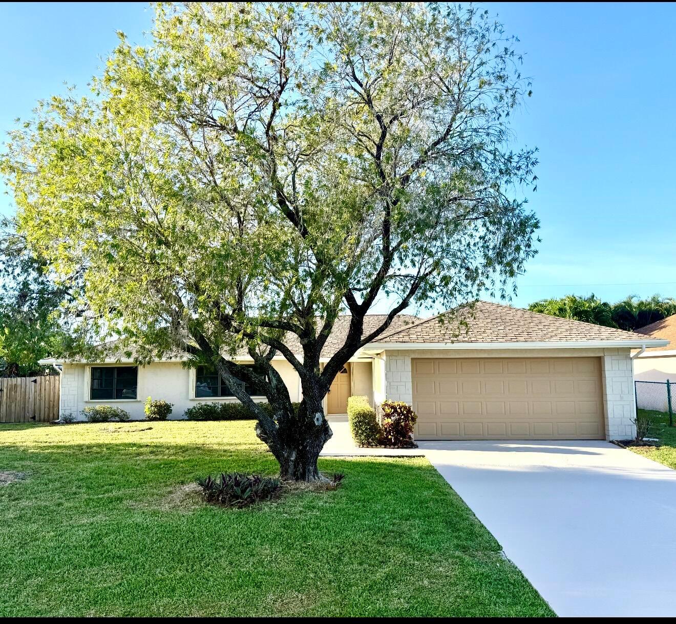 3/2/2 CBS HOME LOCATED IN A QUIET NEIGHBORHOOD, LOCATION, LOCATION, LOCATION! CLOSE TO SHOPPING , SCHOOLS AND PLACES OF WORSHIP, EASY ACCESS TO FLORIDA TURNPIKE AND 95 VIA CROSSTOWN PARKWAY. . HOUSE IS LOCATED MINUTES FROM JENSEN BEACH. HOME HAS OPEN FLOOR PLAN WITH SEPARATE FAMILY, LIVING AND DINING ROOM. LUXURY PLANK FLOORING THRU OUT HOME, NEW CABINETRY IN KITCHEN AND BATHROOMS WITH GRANITE COUNTER TOPS AND INSERTS. HOME IS FULLY FENCED WITH LARGE YARD WITH AN ENCLOSED PORCH WITH SCREEN AND VINYL WINDOWS. HOUSE HAS FULL SET OF ACCORDION SHUTTERS FOR CONVENIENCE IN THE EVENT SHUTTERS ARE NEEDED.