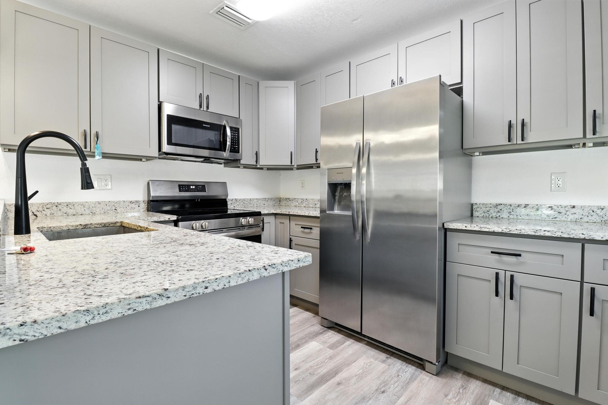 NO RENTAL RESTRICTIONS: Fully renovated 2-bedroom, 1-bathroom villa with single-car garage located on a quiet cul-de-sac in Boynton Place. Features include new flooring, updated kitchen and bathroom, newer appliances, new A/C, water heater, and upgraded FPL circuit board—all less than 2 years old. Stylish wire-free zebra blinds, possible impact windows, hurricane-rated garage door, automatic opener, and keypad lock. Spacious front and fenced back yard with option to build screened patio. Low HOA, pet friendly, lease allowed. Community pool, lakeside benches, and 24/7 security cameras. Convenient to I-95, dining, schools, gyms, and shopping .Public Opinion Pricing: This home is listed without a set price. Please submit your highest and best offer based on current market value.