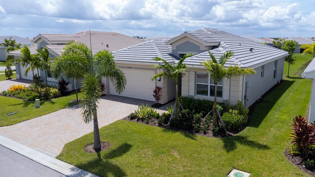 Photo of 15680 SW Egret Coast Drive, Port St Lucie, FL 34987 (MLS # R10914032)