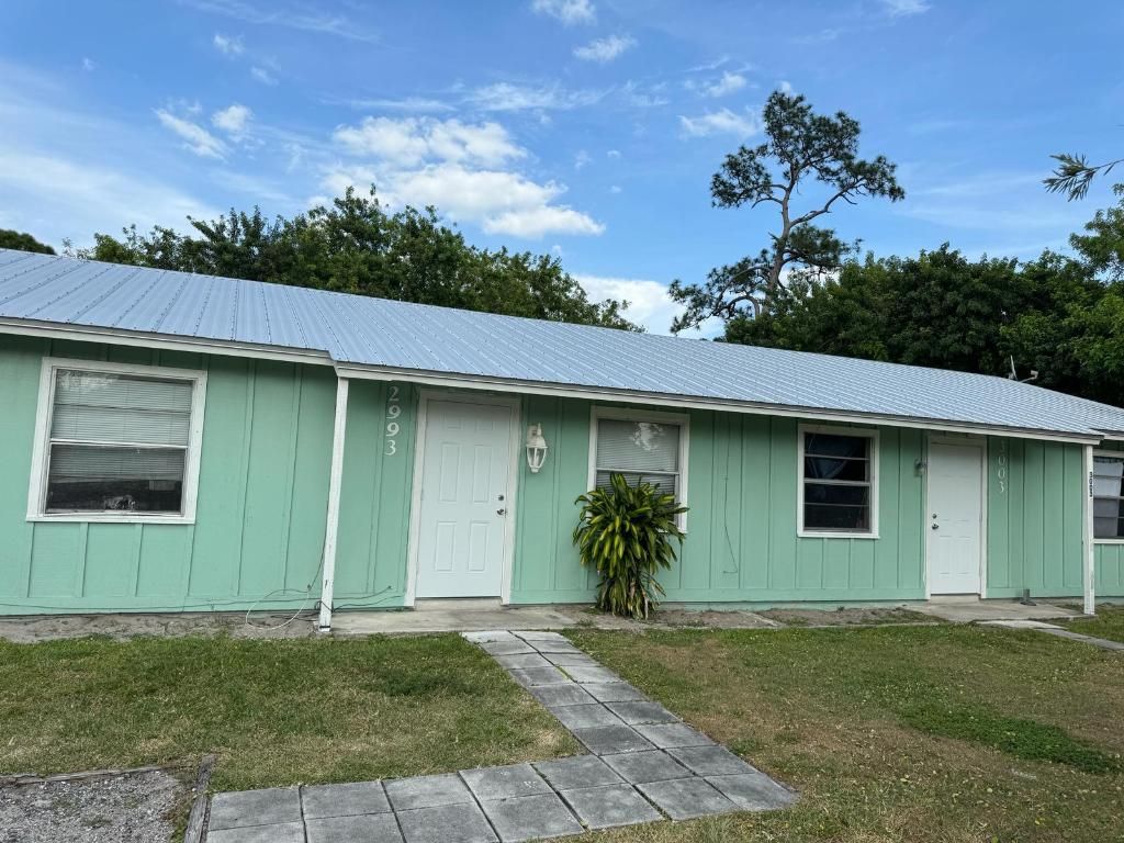 Photo of 2993 SE Camino Avenue, Stuart, FL 34997 (MLS # R10975732)