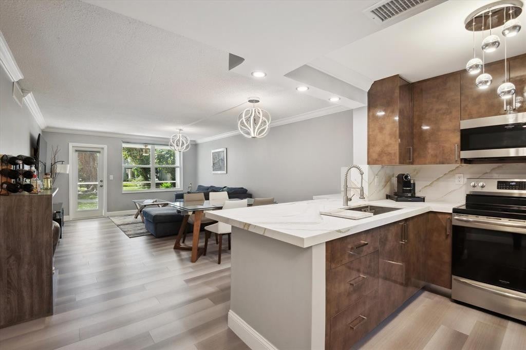 Photo of 4025 N FEDERAL Highway #123C, Oakland Park, FL 33308 (MLS # B26093822)