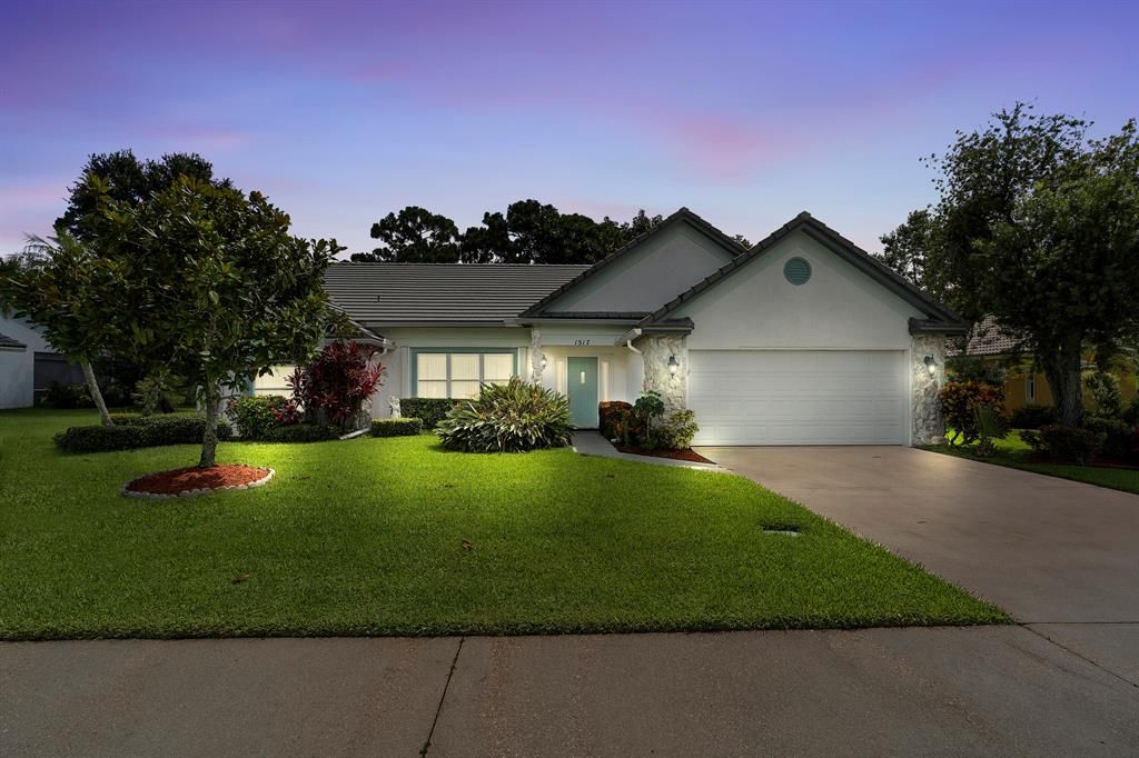 Photo of 1317 SW Briarwood Drive Dr, Port St Lucie, FL 34986 (MLS # R10735754)