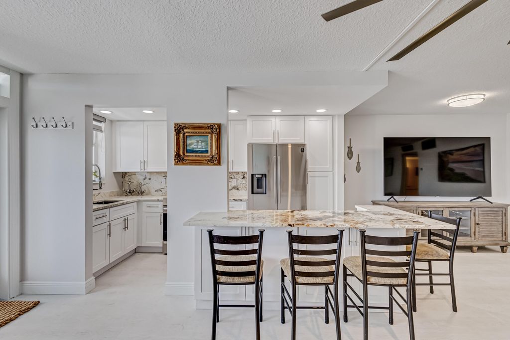 Photo of 104 Paradise Harbour Boulevard #312, North Palm Beach, FL 33408 (MLS # R11066354)