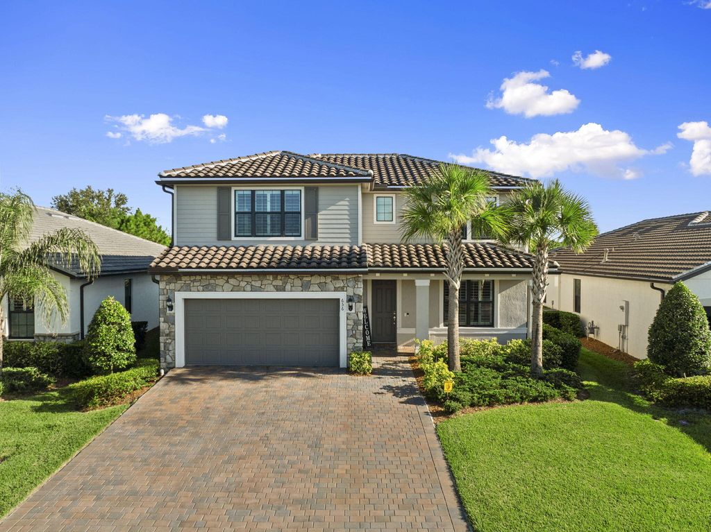 Photo of 656 SE Villandry Way, Port Saint Lucie, FL 34984 (MLS # R11109886)