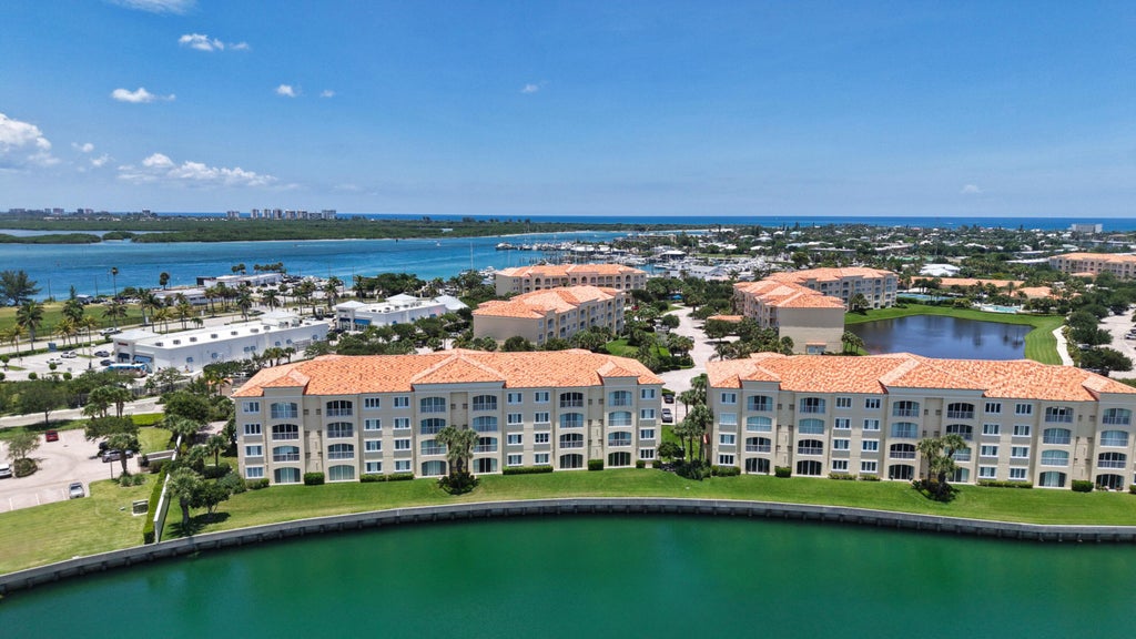 Photo of 34 Harbour Isle Dr DR W #204, Fort Pierce, FL 34949 (MLS # B26033300)