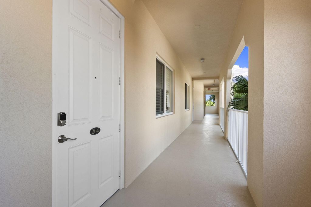 Photo of 34 Harbour Isle Dr DR W #204, Fort Pierce, FL 34949 (MLS # B26033300)