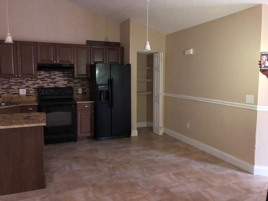 Photo of 5305 Eagle Lake Drive, Palm Beach Gardens, FL 33418 (MLS # R11133531)