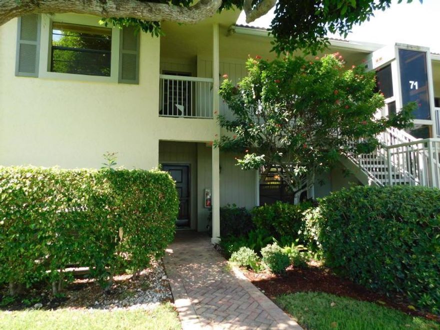 Don't miss this rare 1st floor 3BR/2BA corner condo !!  With SIDE ADDITION and ENCLOSED REAR PATIO, this spacious condo offers plenty of space for entertaining !! Enjoy stunning lake and golf views from your glass enclosed patio!  Conveniently located across from satellite pool ! Your new home awaits !! Hunters Run is a stunning country club community that features 3 golf courses, 20 Tennis courses, 4 Pickle Ball Courts, 8 dining venues, GORGEOUS, newly renovated, resort-style pool and hair salon & spa with top rated fitness center.   Country Club living at its best. Mandatory Membership.