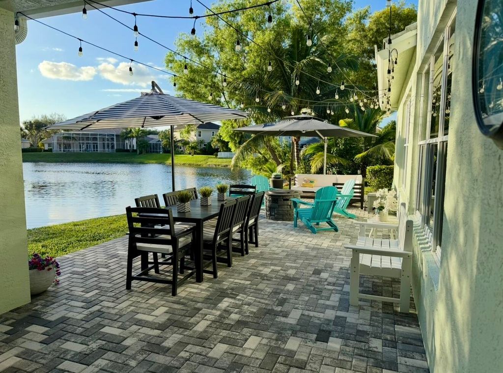 Photo of 265 Swallowtail Lane, Jupiter, FL 33458 (MLS # B26020067)