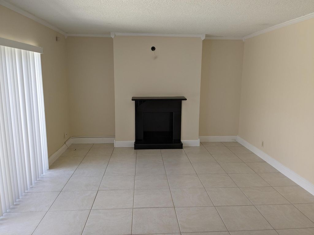 Photo of 1674 Forest Lakes Circle #C, West Palm Beach, FL 33406 (MLS # R10979223)