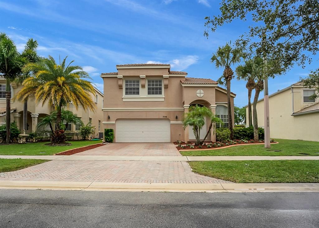 Photo of 7156 Copperfield Circle Cir, Lake Worth Beach, FL 33467 (MLS # R10805728)