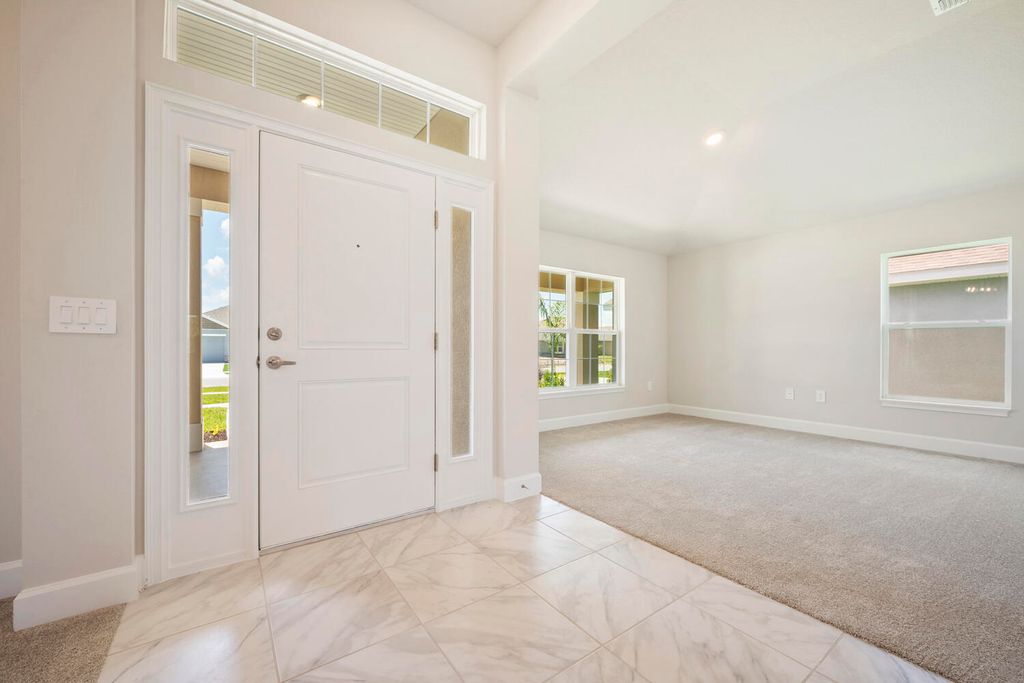 Photo of 8782 Waterstone Boulevard, Fort Pierce, FL 34951 (MLS # R11018701)