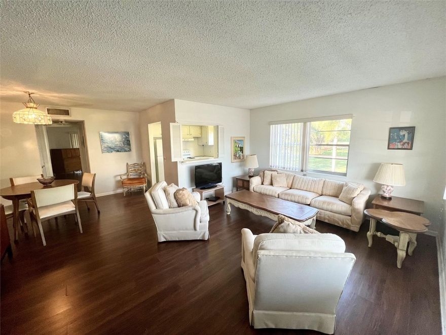 ONE OF THE BEST LOCATIONS IN THE VILLAGE! RESORT STYLE AMENITIES ARE IN YOUR BACKYARD!  SECOND FLOOR CORNER CONDO, LIGHT AND BRIGHT! BUILDING IS RENTABLE AFTER ONE YEAR. PARTIALLY FURNISHED WITH LAMINATE FLOORING THROUGHOUT.  STORM SHUTTERS ON ALL WINDOWS.  CENTURY VILLAGE BOASTS A 5 STAR CLUBHOUSE WITH A INDOOR AND OUTDOOR POOLS, THEATER, PICKLEBALL, FITNESS CENTER, RESTAUARANT, GAMES AND CARD ROOMS, COURTESY SHUTTLE AND SO MUCH MORE!