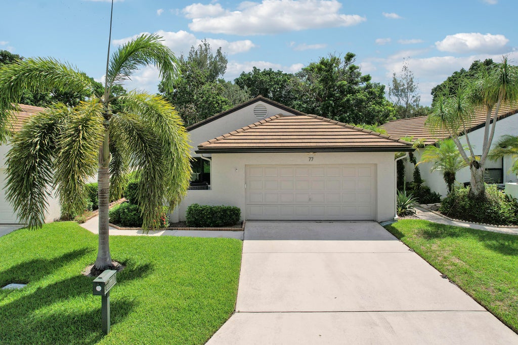 Photo of 77 Ironwood Way N, Palm Beach Gardens, FL 33418 (MLS # B26074497)