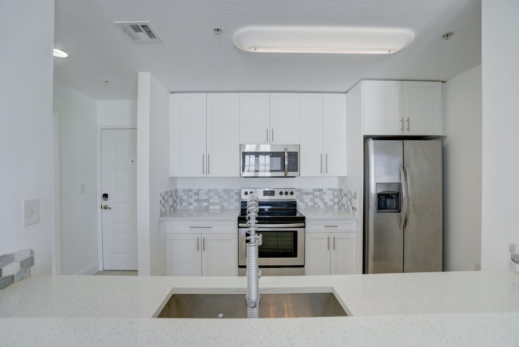 Photo of 1200 Town Center Drive #504, Jupiter, FL 33458 (MLS # R10931053)