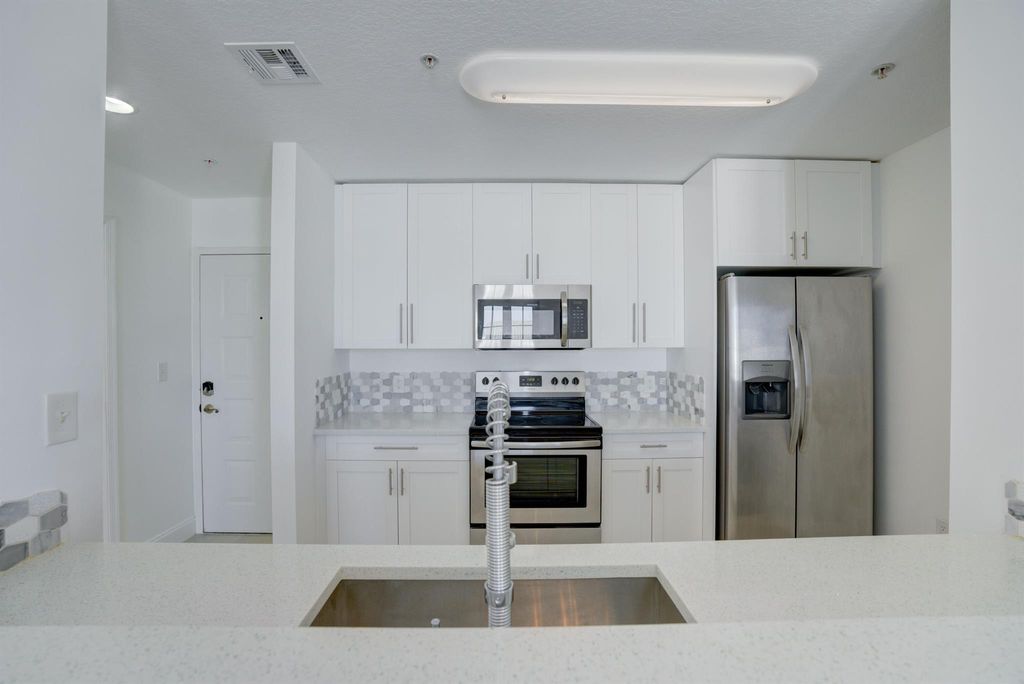 Photo of 1200 Town Center Drive #504, Jupiter, FL 33458 (MLS # R10931053)