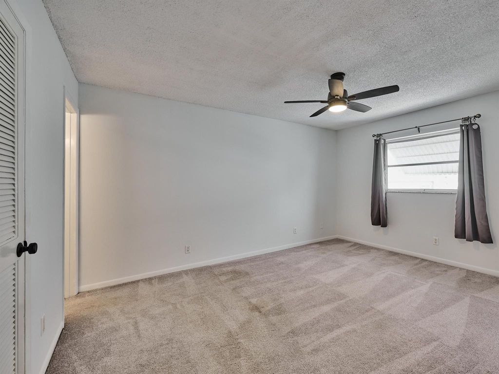 Photo of 227 Castlewood Drive #203, North Palm Beach, FL 33408 (MLS # R11139811)