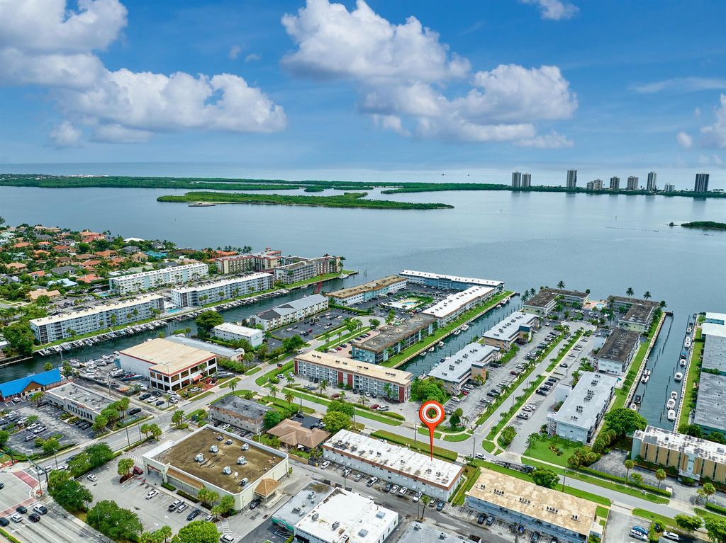 Photo of 227 Castlewood Drive #203, North Palm Beach, FL 33408 (MLS # R11139811)