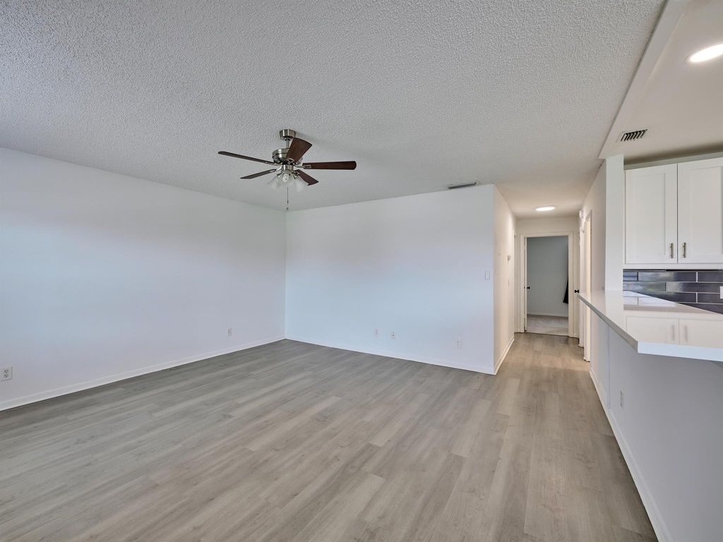 Photo of 227 Castlewood Drive #203, North Palm Beach, FL 33408 (MLS # R11139811)