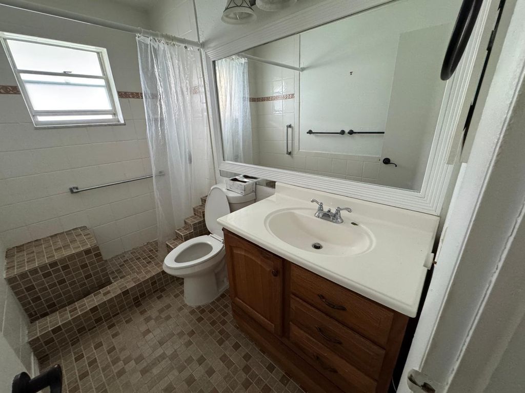 Photo of 2397 SW Congress Boulevard, Boynton Beach, FL 33426 (MLS # F10496090)