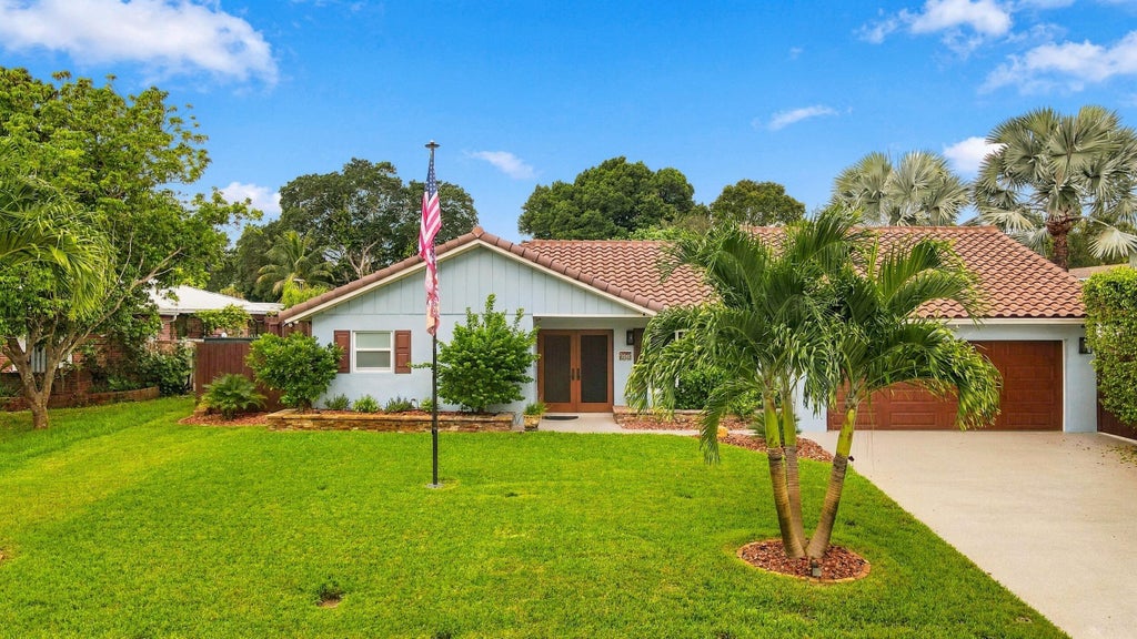 Photo of 3590 Lakeview Drive, Delray Beach, FL 33445 (MLS # B26083131)