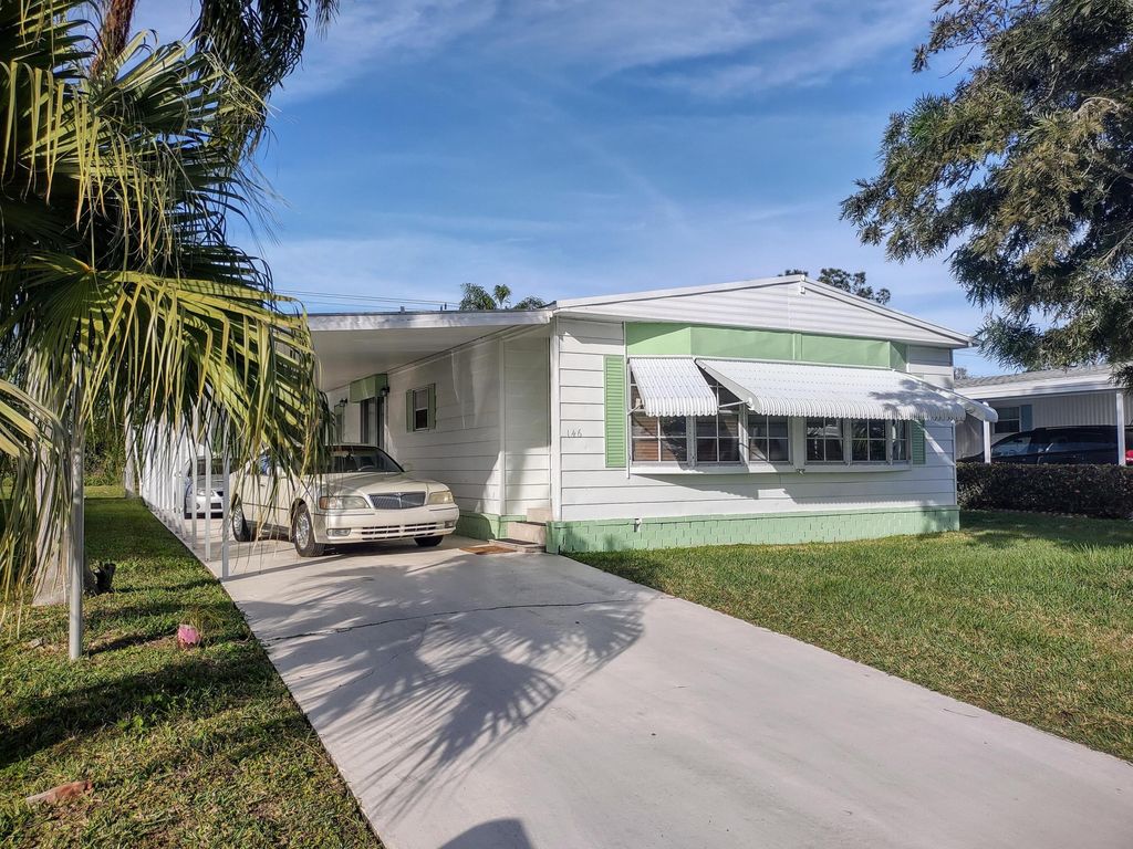 Photo of 146 W Caribbean, Port Saint Lucie, FL 34952 (MLS # R11024833)