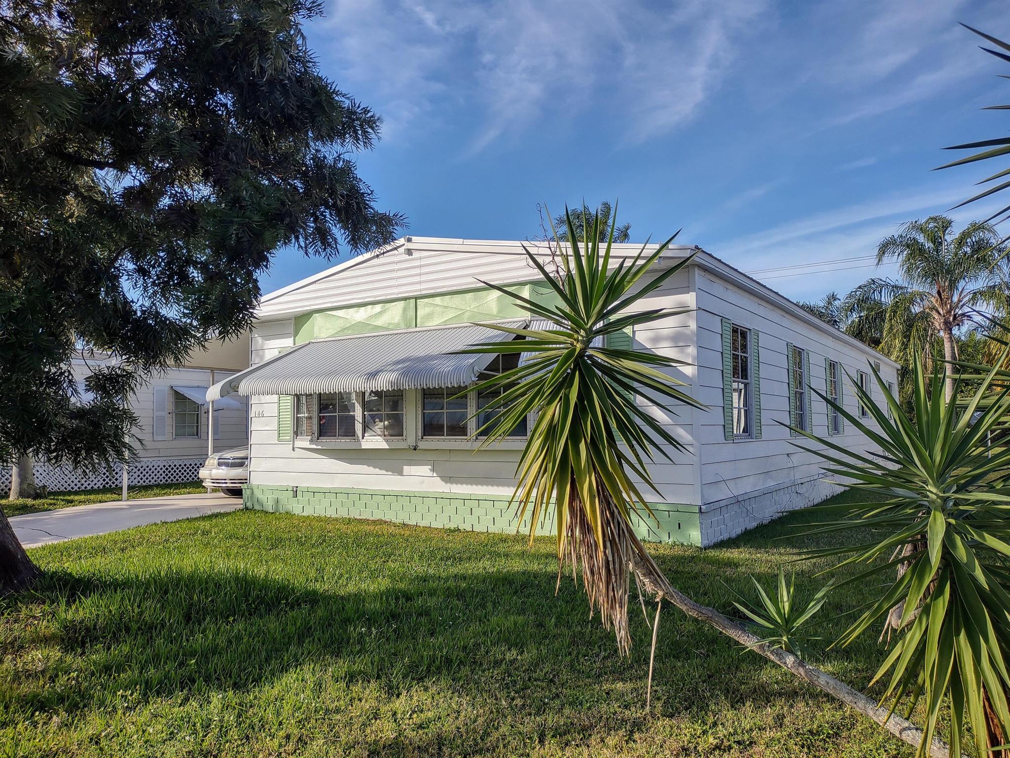 55 Plus Community. This move-in ready home has 2 bed 2 bath, NEW METAL ROOF 2002, New Ductwork and Motor on AC Unit 2022. No soft spots. Floor tiles in most of the house. Bonus Sun room.Market rent (new owner): $1,021.87 a month for 12 months