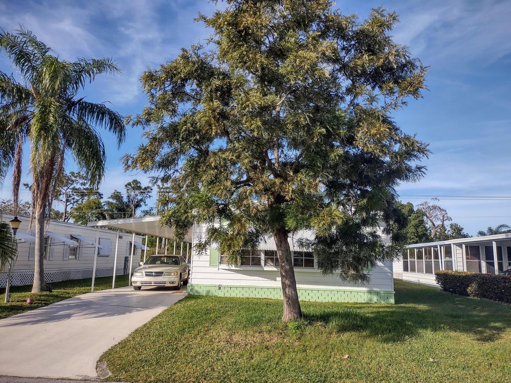 Photo of 146 W Caribbean, Port Saint Lucie, FL 34952 (MLS # R11024833)