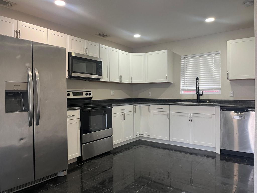 Photo of 838 SE Proctor Lane, Port Saint Lucie, FL 34983 (MLS # R11163125)