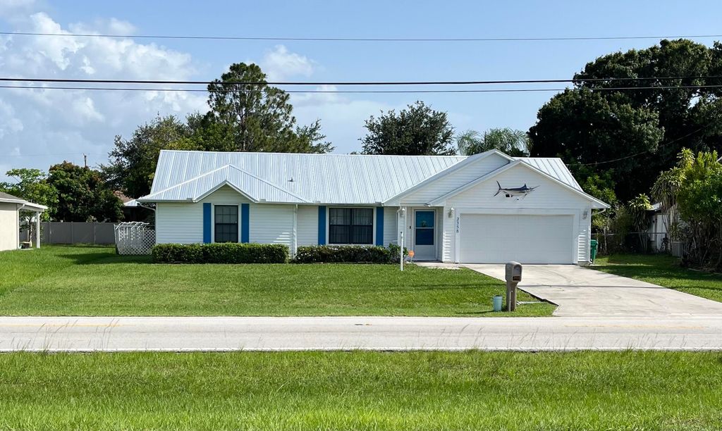Photo of 2358 SE Tiffany Avenue, Port Saint Lucie, FL 34952 (MLS # R11145938)