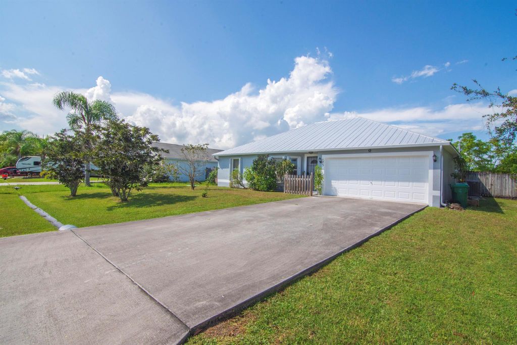 Photo of 173 SW Ray Avenue, Port St Lucie, FL 34983 (MLS # R10921317)