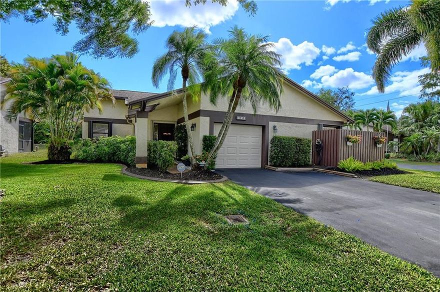 DO NOT MISS OUT ON THIS ONE!! CHARMING SINGLE FAMILY HOUSE EXTREMELY WELL MAINTAINTED. SPACIOUS 2 BEDROOMS, 2 BATHROOMS WITH OVERSIZED 1 CAR GARAGE. THIS HOUSE HAS A LOT TO OFFER!! GREAT LOCATION IN A CUL-DE SAC ON A QUIET STREET STEPTS TO THE COMMUNITY POOL. IMPACT ACCORDION SHUTTERS ON ALL WINDOWS & DOOR. SPACIOUS MASTER BEDROOM WITH A LARGE WALK-IN CLOSET. VOLUME CEILINGS. SPACIOUS DINING ROOM CAN BE CLOSED FOR A 3RD BEDROOM. OPEN & BRIGHT KITCHEN WITH LOTS OF NATURAL LIGHT. LARGE PRIVATE COVERED SCREENED PATIO WITH INGROUND JACUZZI. PRIVATE BACK YARD WITH TROPICAL LANDSCAPING.  WASHER & DRYER IN THE GARAGE. ATTICK ACCESS. WELCOME TO WEST BOCA ARBOR WOOD VILLAS. GREAT FAMILY NEIGHBORHOOD. OFFERS A COMMUNITY POOL & CLUBHOUSE.  HOA FEES $238.00 / MONTH.  ALL AGE COMMUNITY. WELCOME HOME!!