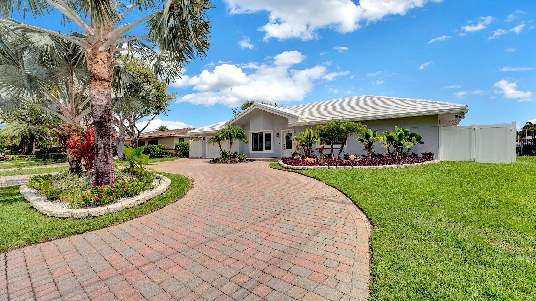 Welcome to 2739 NE 10th St in the coveted Harbor Village Isle. This 3-bed, 3-bath waterfront home offers 80 feet of direct ocean access with no fixed bridges, just three homes from the Intracoastal. Set on a wide T-shaped canal, it features an 80' dock with water/electric--perfect for larger vessels. Interior highlights include impact windows/doors and a bright, open layout ideal for indoor-outdoor living. Enjoy the best of South Florida--just minutes to the beach, waterfront dining, and the Pompano Beach Pier. A rare opportunity to live the ultimate boating lifestyle in one of Pompano's most desirable neighborhoods.