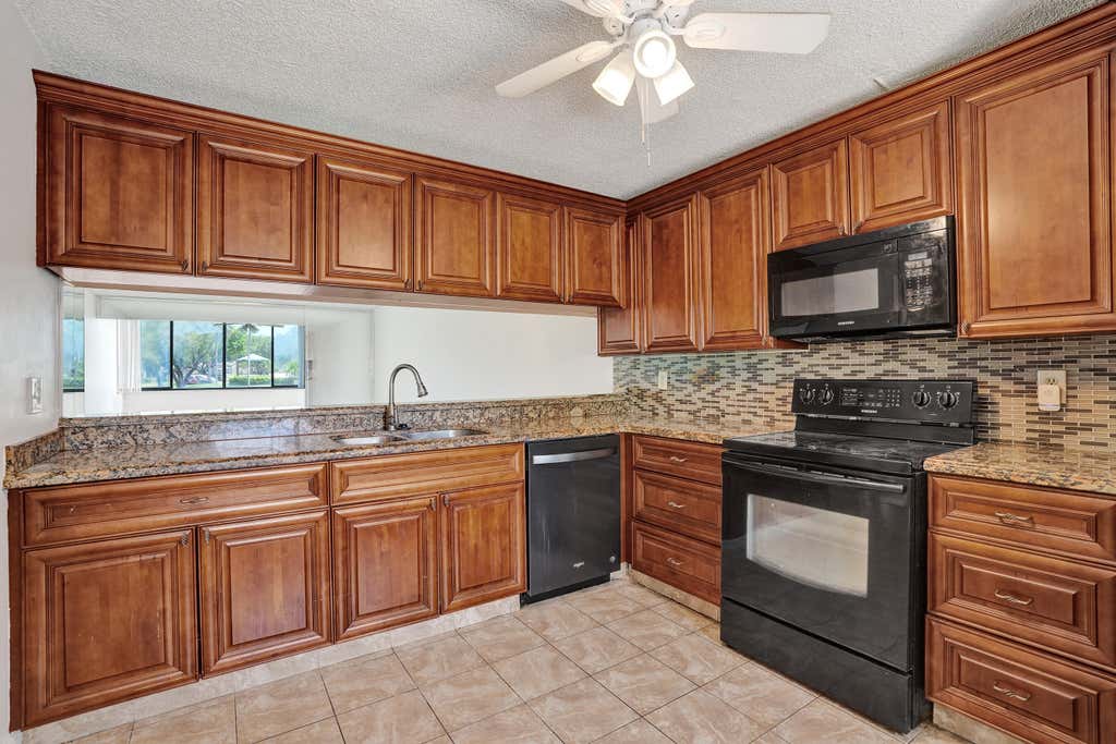 Photo of 8030 Hampton Boulevard #106, North Lauderdale, FL 33068 (MLS # B26068382)