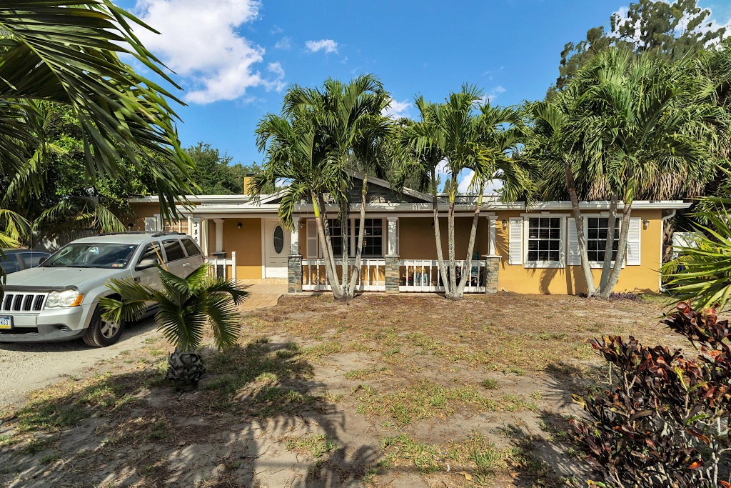 Photo of 3861 Wry Road, Greenacres, FL 33467 (MLS # R11100120)